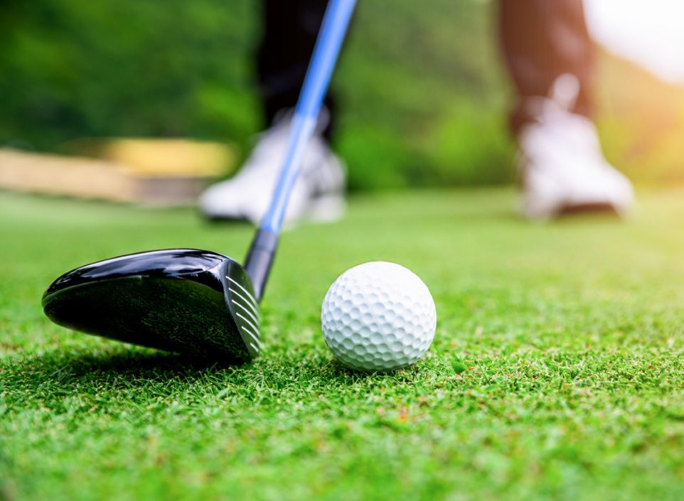 Close-up of man golfing