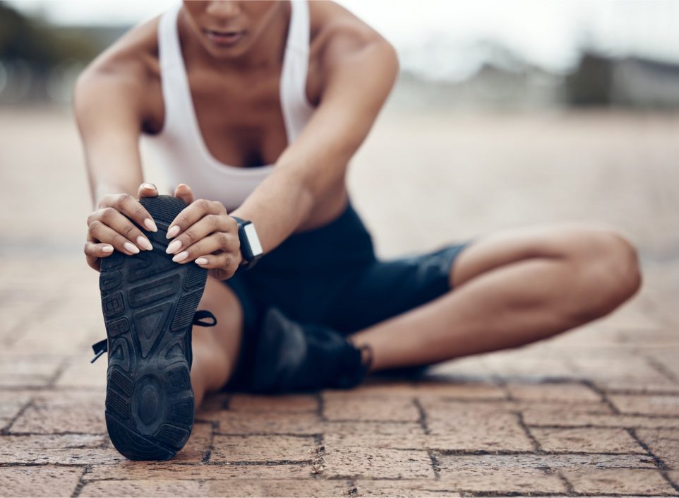 Woman stretching her leg